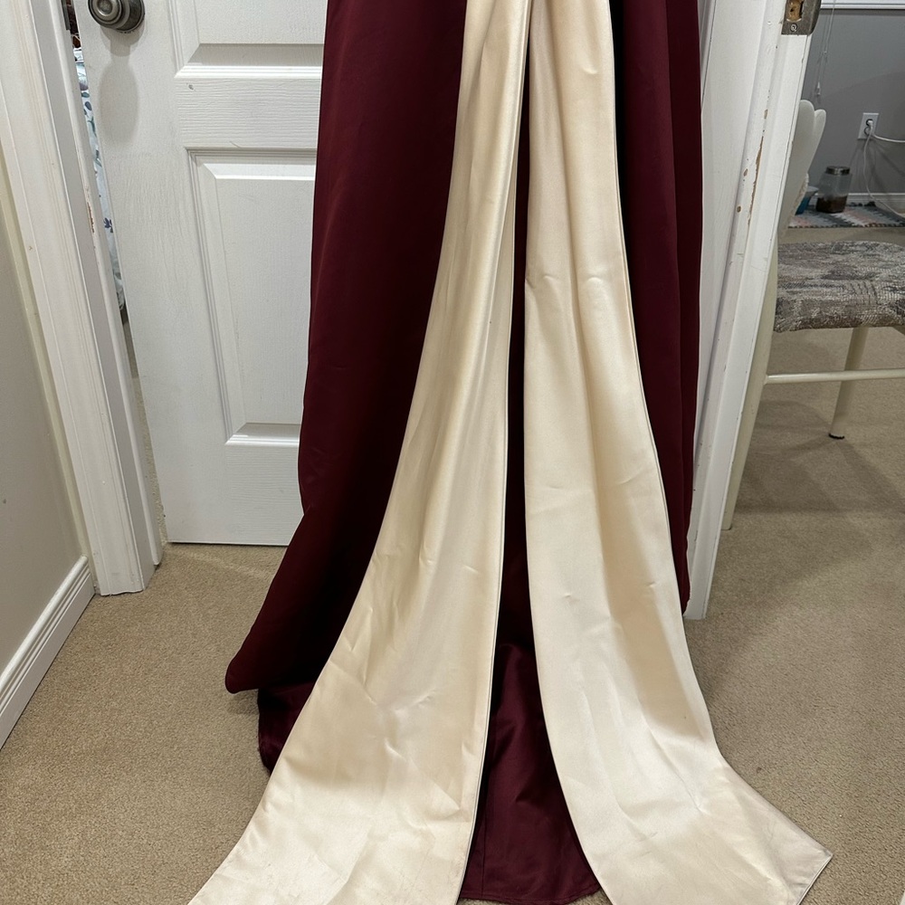 Elegant Alexia designs Burgundy and Cream belt Gown! Size 6 - 8. With long train